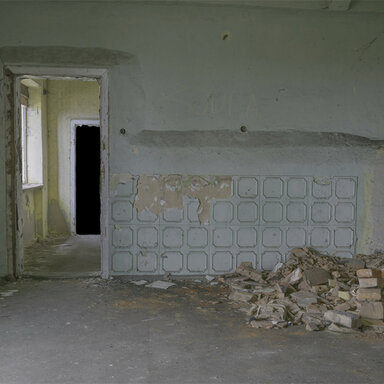 Two social rooms in a ruined building